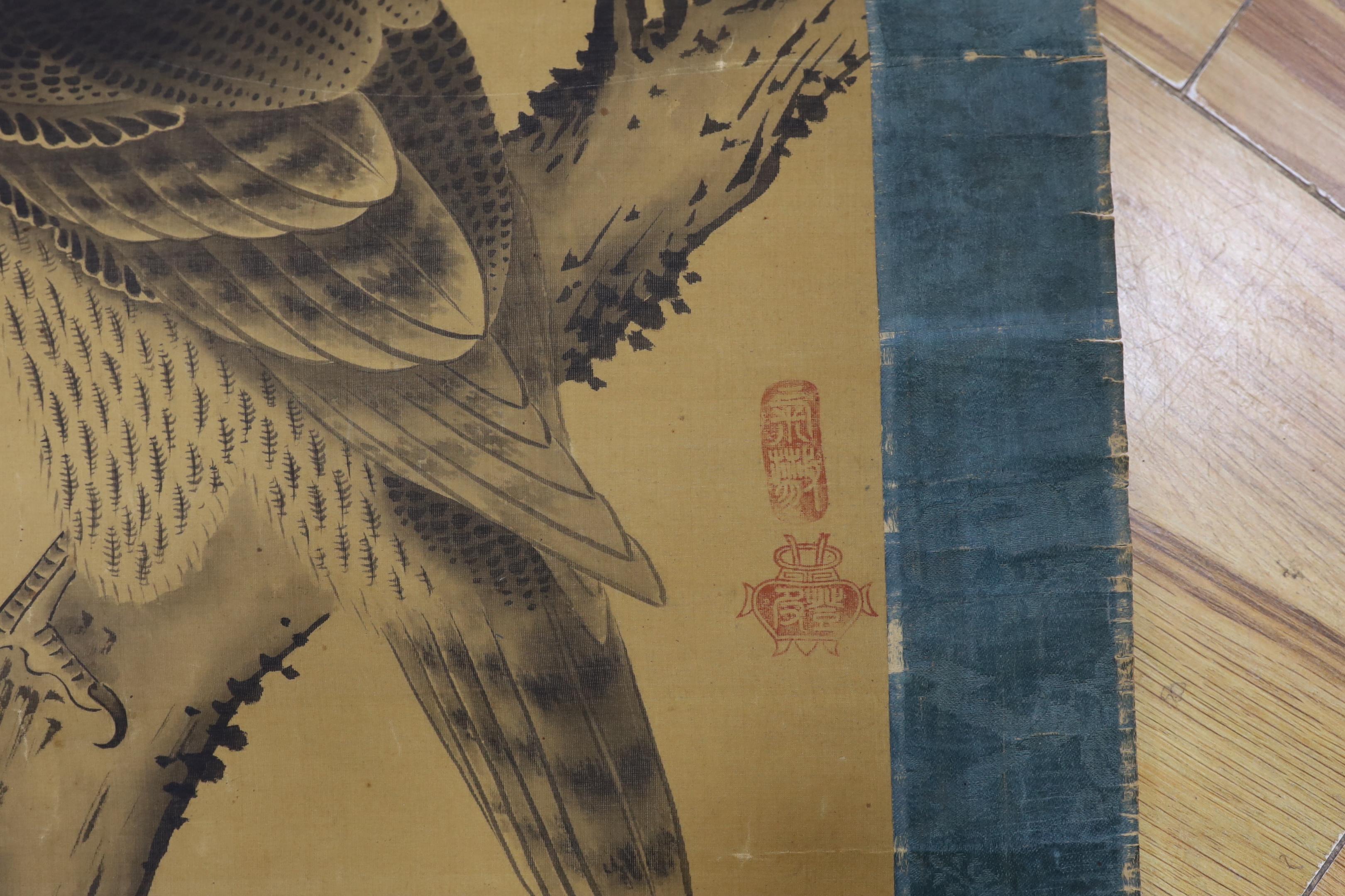 A 20th century scroll painting of a harbour scene and a Japanese scroll painting of a bird of prey, longest 165cm